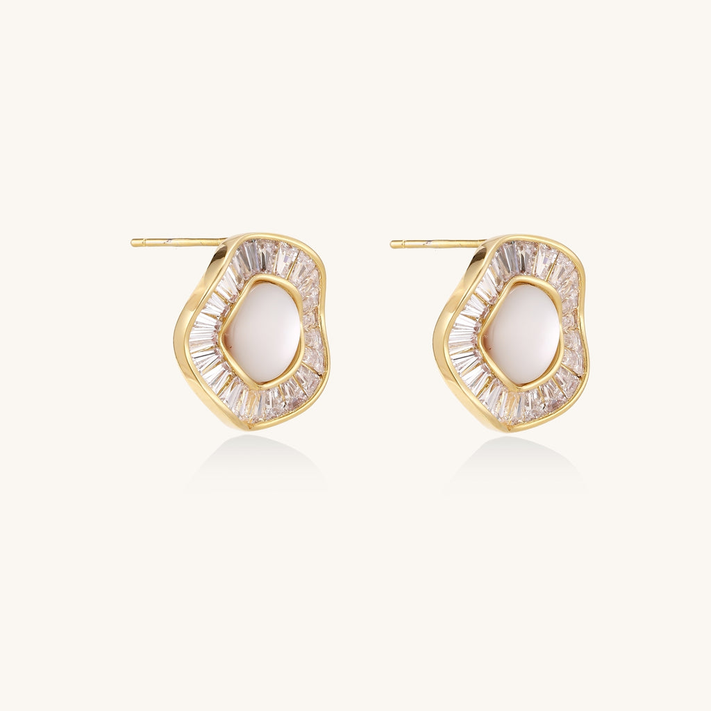Gold-plated stud earrings with central freshwater pearl surrounded by baguette crystals in radial pattern